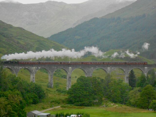 Jacobite steam train crossing Glenfinnan Viaduct