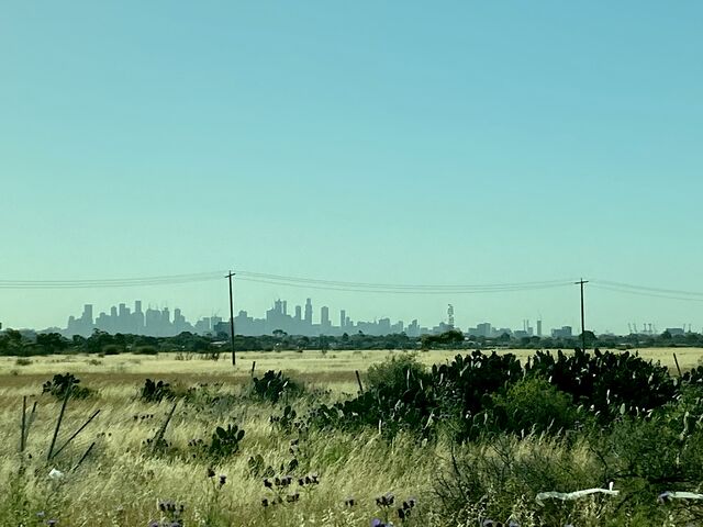 View of Melbourne’s skyline as the XPT passes through Sunshine North