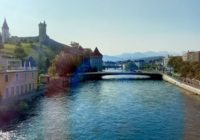 The train arriving in Lucerne. The old city walls and towers are visible in the left of the picture.