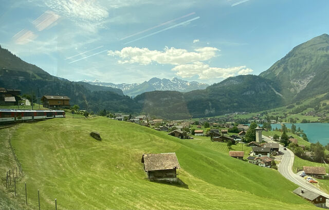 The remnants of Lungern's Alter Kirchturm (old church tower), constructed in 1383, are visible in the right of this picture