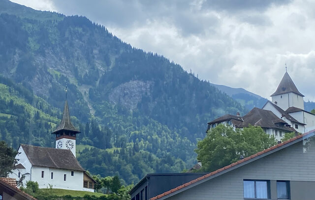 On the left is Wimmis’ Romanesque Church, built in the 10th Century. On the right is Wimmis Castle, built in the 12th–13th Century.