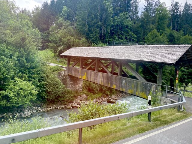 Covered wooden bridges cross the River Simme