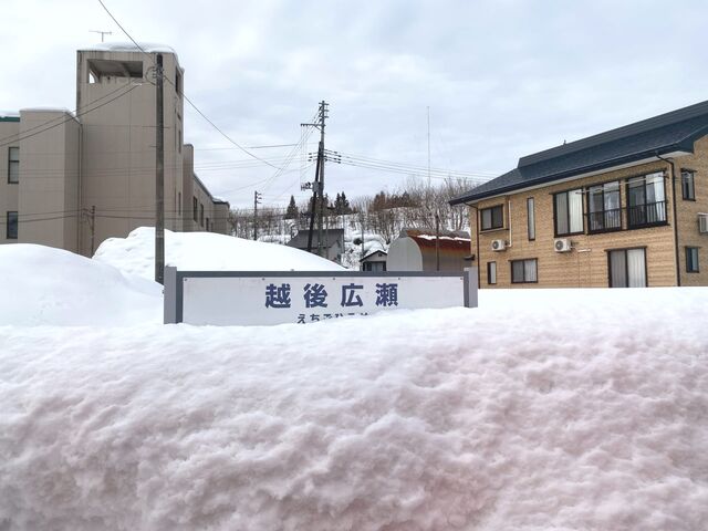 Snow piled high on the Tadami Line