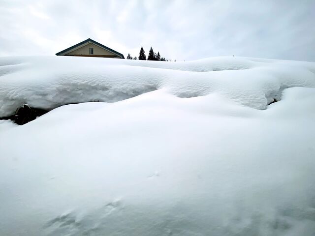 Snow piled high on the Tadami Line