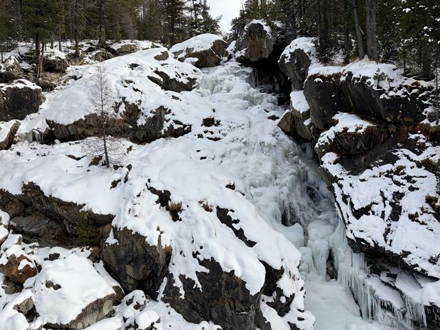 Frozen waterfall adjacent to the Ova da Bernina