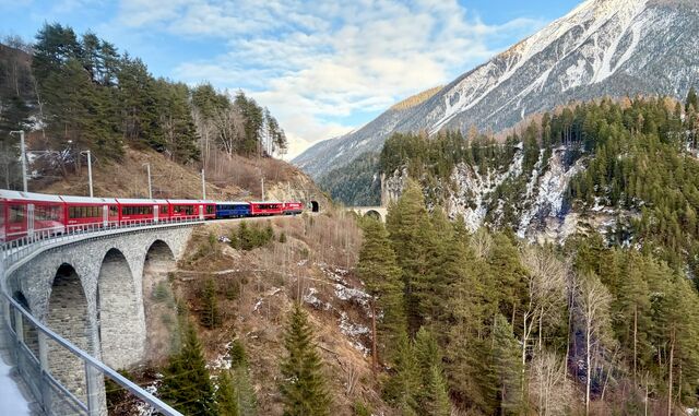 Schmittnertobel Viaduct, with the Landwasser Viaduct in the background