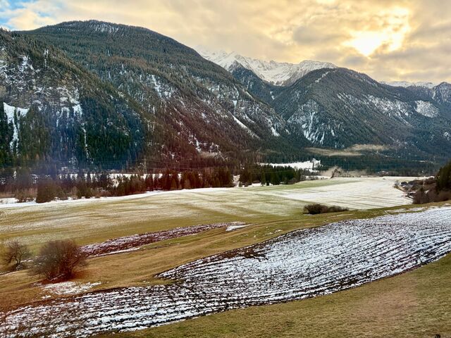 Schmittnertobel Viaduct, with the Landwasser Viaduct in the background