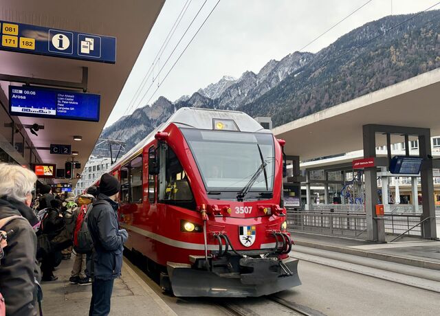 Boarding the train outside Chur Station